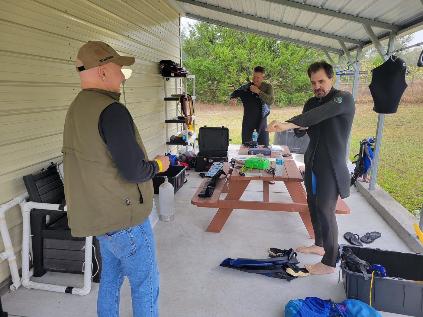 Students suiting up in the covered gear-up area